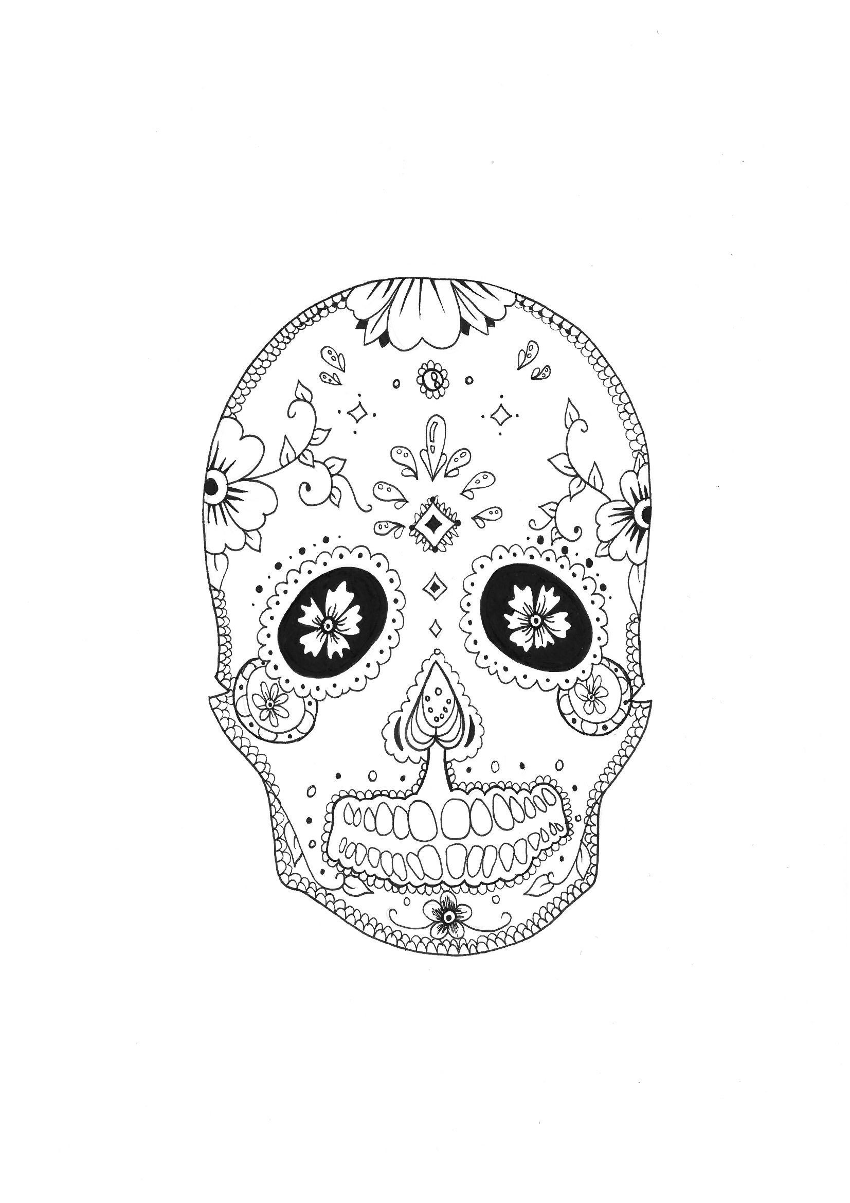 A coloring page of skull with flower patterns very relaxing.